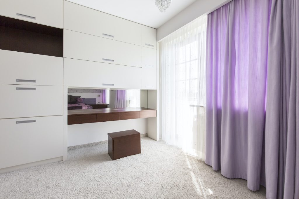 Purple curtains in the bedroom